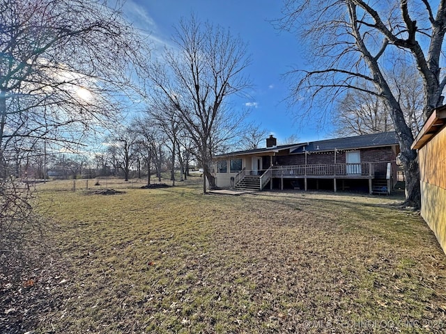 view of yard with a deck