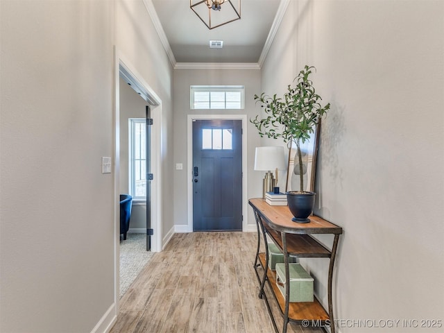 7113 E Princeton St, Broken Arrow, OK 74014 - entrance foyer featuring light wood finished floors and ornamental molding
