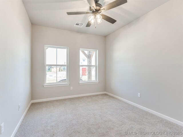 7113 E Princeton St, Broken Arrow, OK 74014 - carpeted spare room featuring baseboards and a ceiling fan