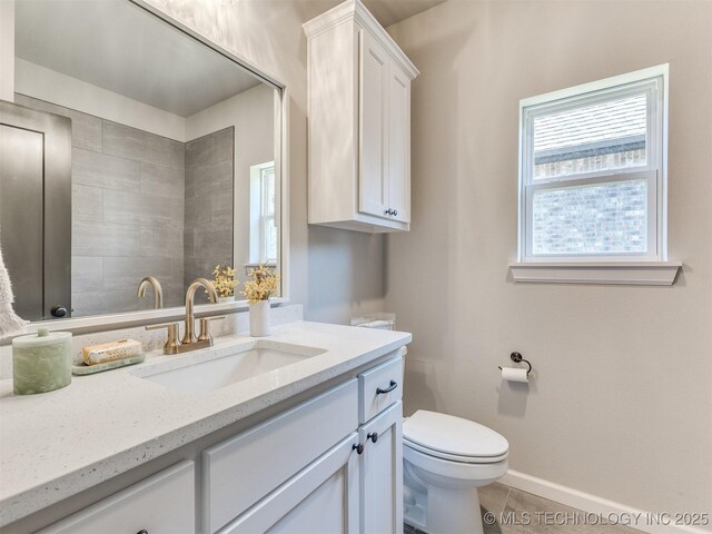 7113 E Princeton St, Broken Arrow, OK 74014 - bathroom with vanity and tile patterned floors