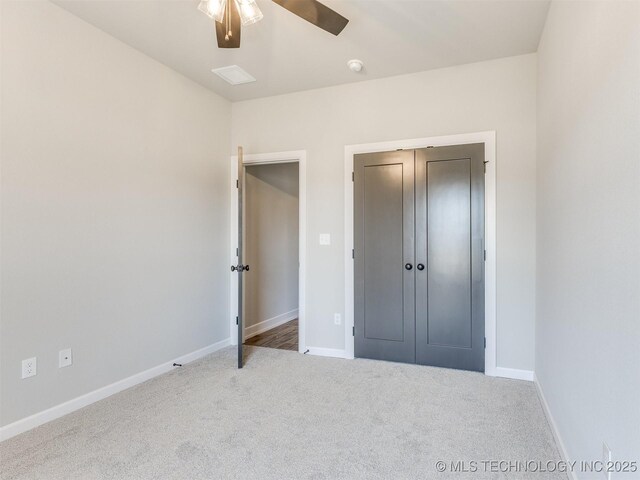 7113 E Princeton St, Broken Arrow, OK 74014 - unfurnished bedroom with carpet flooring, a closet, and a ceiling fan