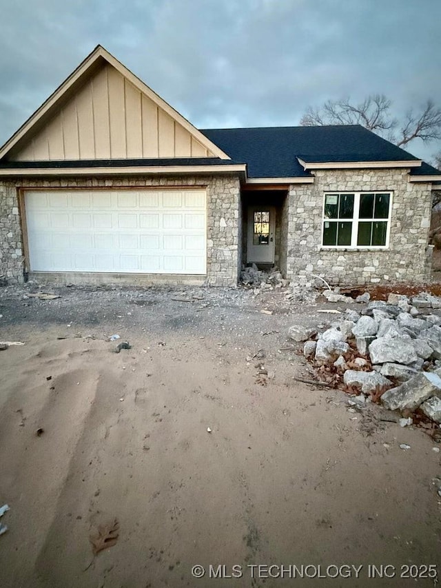 view of front of property with a garage