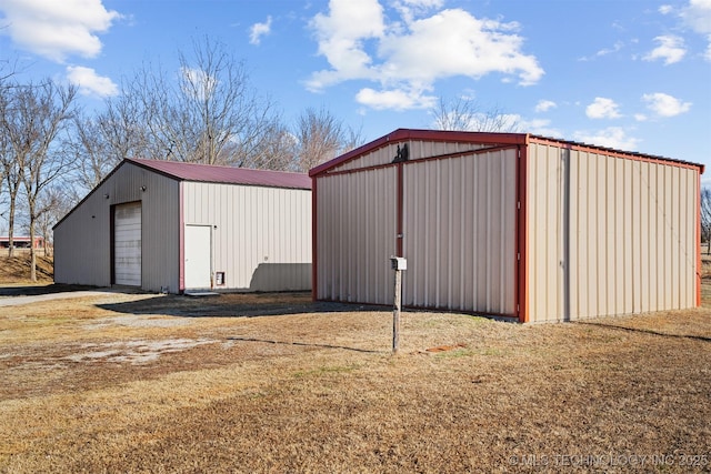 view of outbuilding with a garage