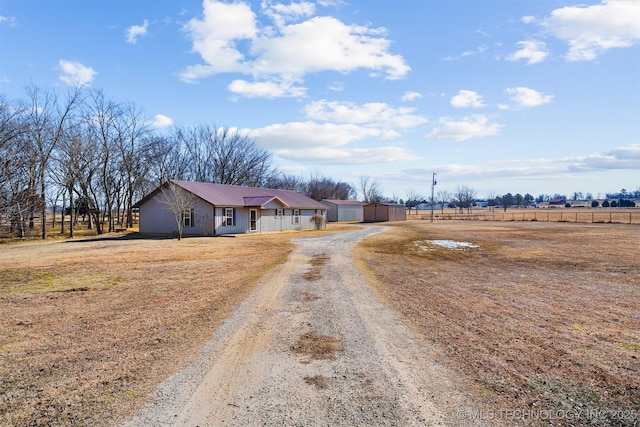 view of road featuring a rural view