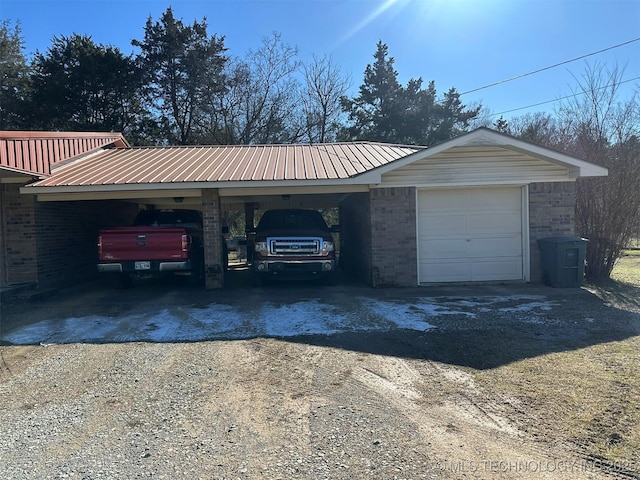 garage with a carport