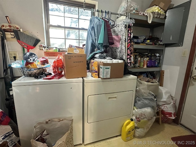 clothes washing area with independent washer and dryer