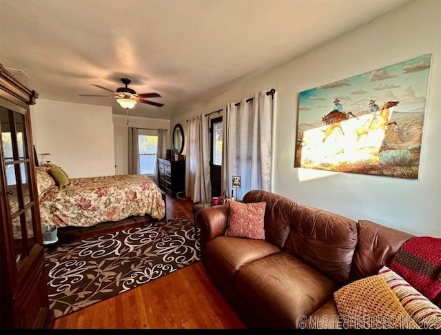 bedroom featuring hardwood / wood-style flooring and ceiling fan