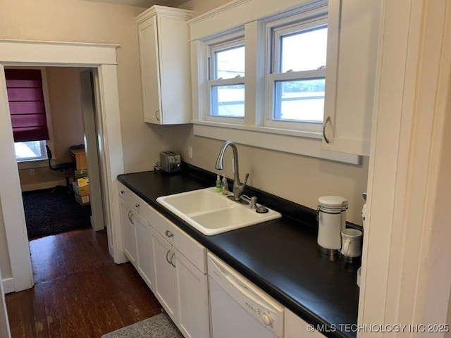 kitchen with white cabinetry, sink, dark wood-type flooring, and white dishwasher