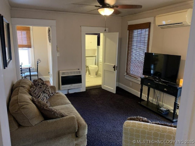 living room with a wall mounted air conditioner, heating unit, ceiling fan, and crown molding