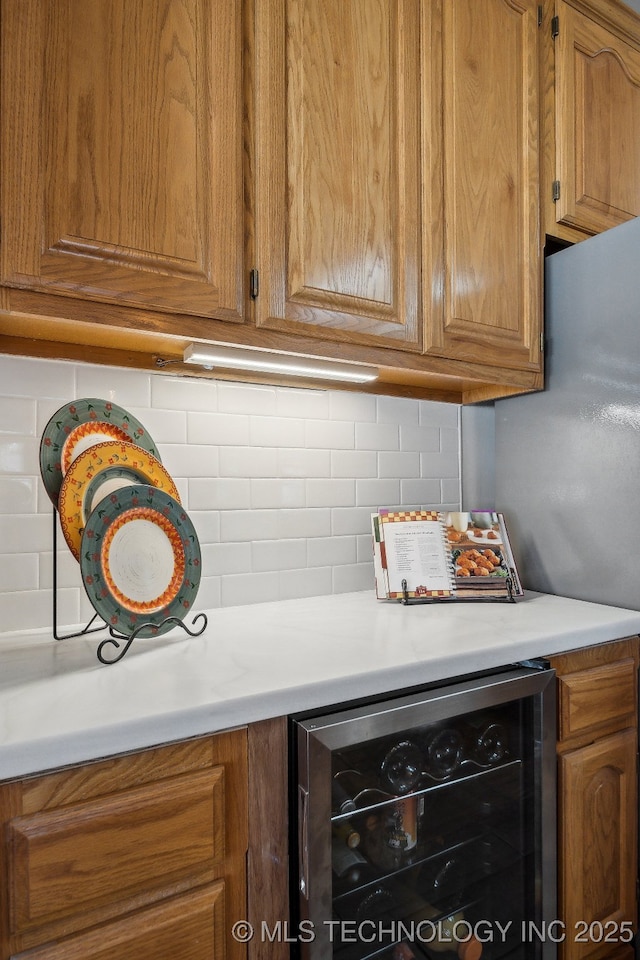 interior space with backsplash and wine cooler