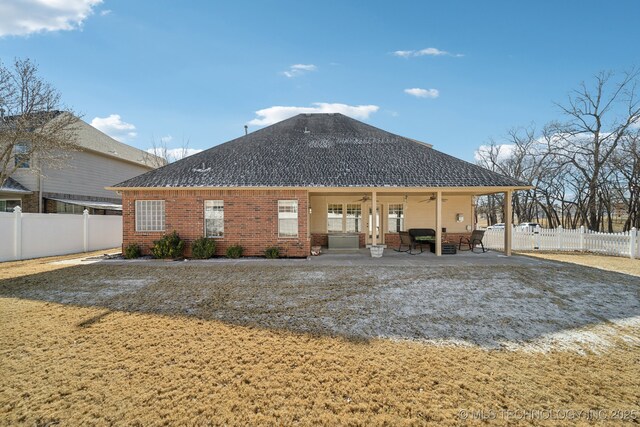 back of house featuring a patio