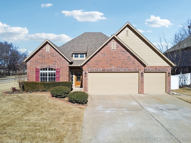 front of property featuring a garage and a front lawn