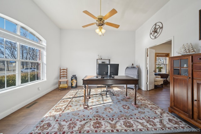 office with ceiling fan and dark hardwood / wood-style floors