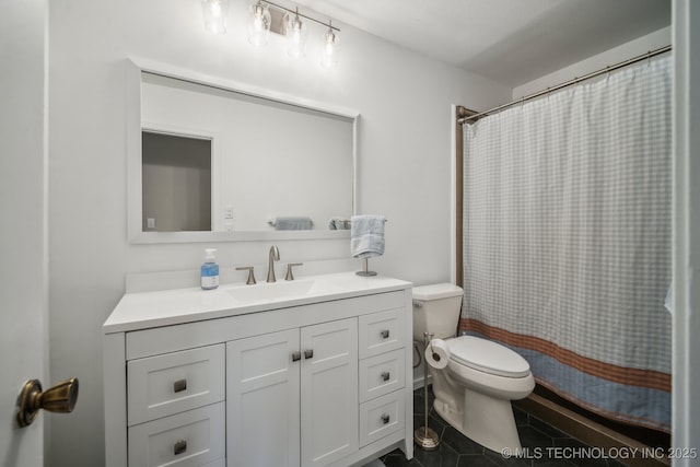 bathroom with tile patterned flooring, vanity, curtained shower, and toilet