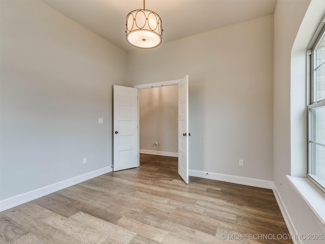 1412 N 70th St, Broken Arrow, OK 74014 - unfurnished room with wood finished floors