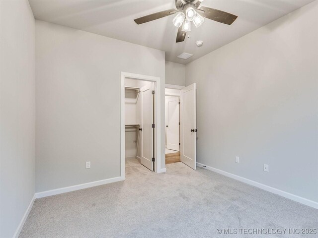 1412 N 70th St, Broken Arrow, OK 74014 - unfurnished bedroom with carpet flooring, a walk in closet, ceiling fan, and a closet