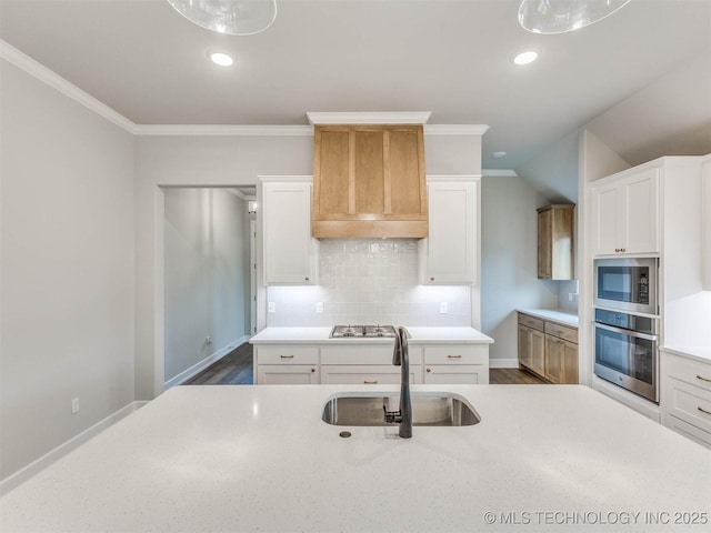 1412 N 70th St, Broken Arrow, OK 74014 - kitchen featuring stainless steel appliances, tasteful backsplash, crown molding, recessed lighting, and white cabinetry