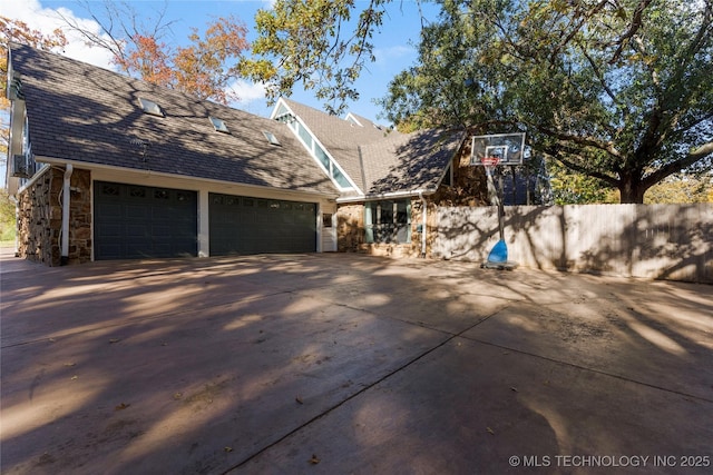 exterior space with a garage