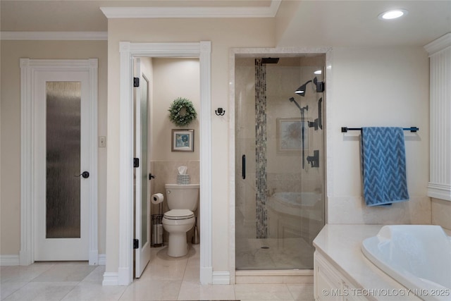 bathroom with ornamental molding, toilet, tile patterned floors, and separate shower and tub