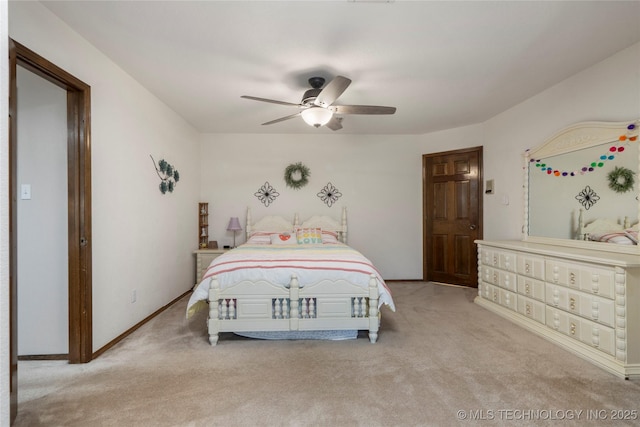 unfurnished bedroom with ceiling fan and light carpet