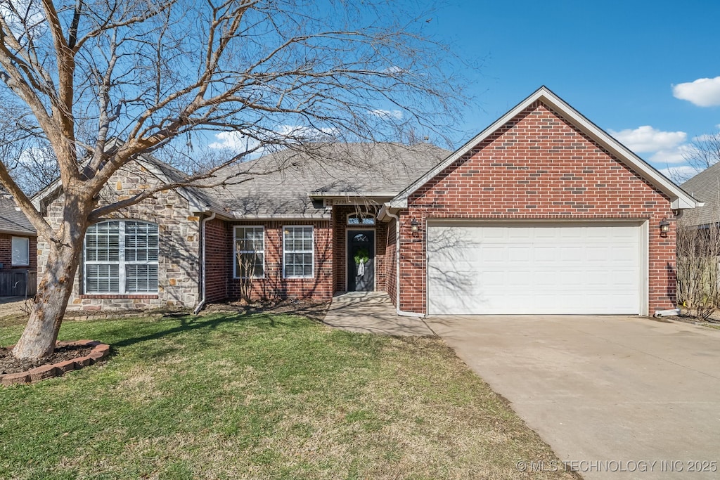 single story home with a garage and a front yard