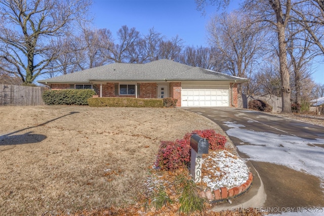 ranch-style house featuring a garage