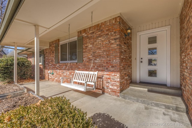 entrance to property with covered porch