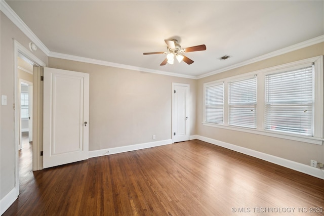 unfurnished room with crown molding, hardwood / wood-style flooring, and ceiling fan