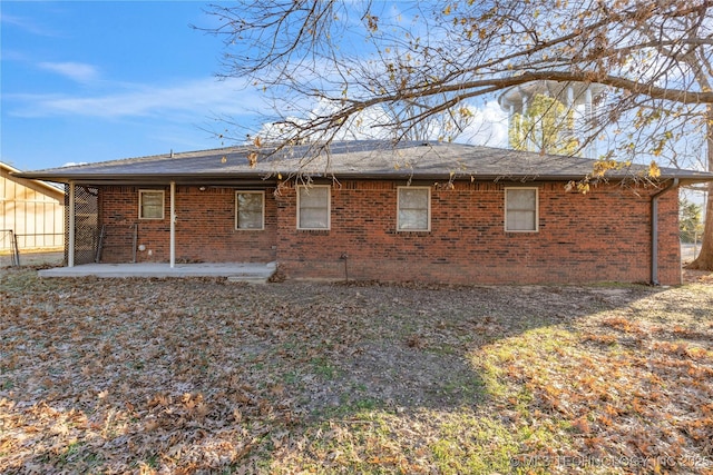 rear view of property featuring a patio