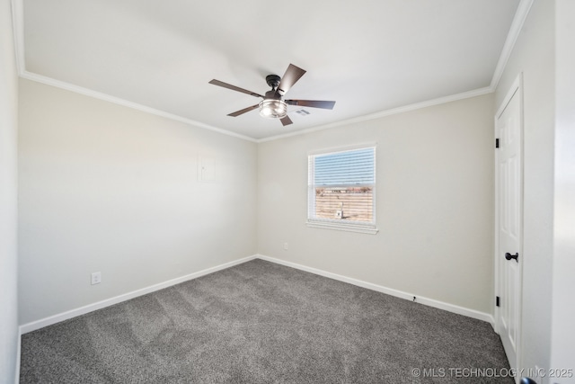 carpeted spare room with ornamental molding and ceiling fan