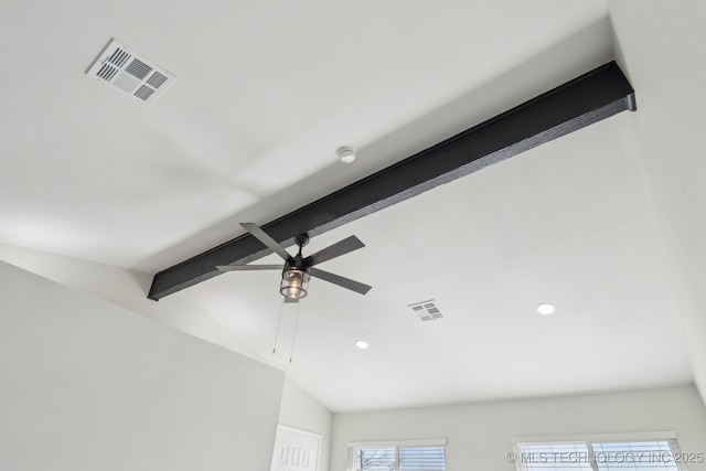 interior details with ceiling fan and beamed ceiling