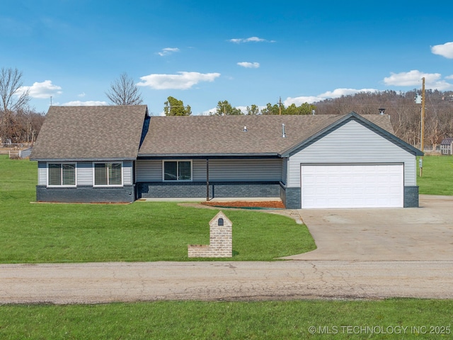 single story home with a garage and a front yard