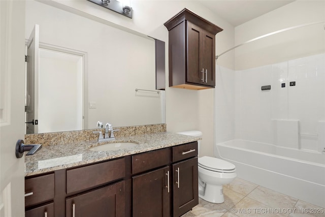 bathroom featuring bathing tub / shower combination, vanity, tile patterned flooring, and toilet