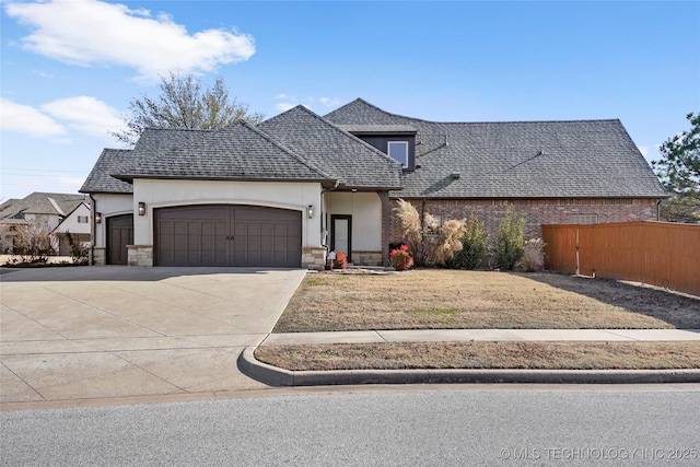 view of front of property featuring a garage