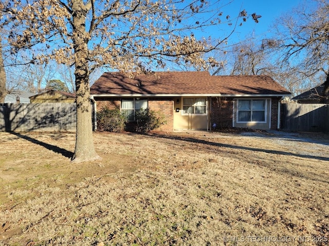 view of front of home with a front lawn