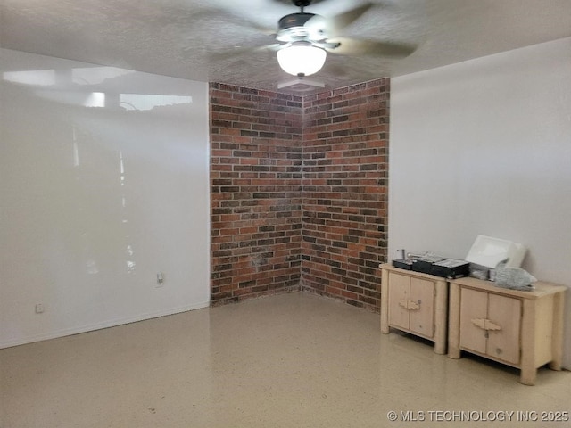 empty room with brick wall