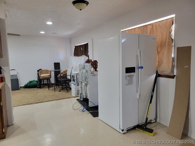 109 S E St, Eufaula, OK 74432 - interior space with a textured ceiling