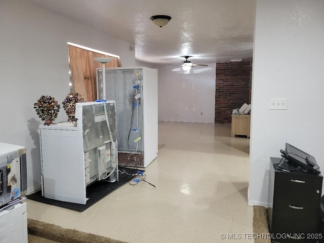 interior space featuring ceiling fan