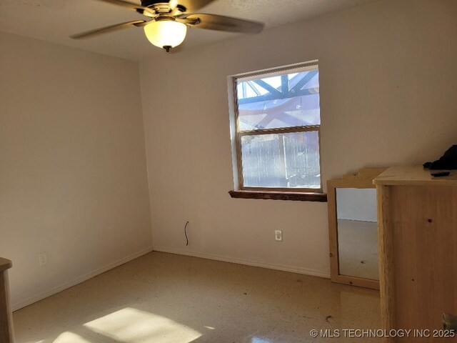 109 S E St, Eufaula, OK 74432 - empty room with ceiling fan