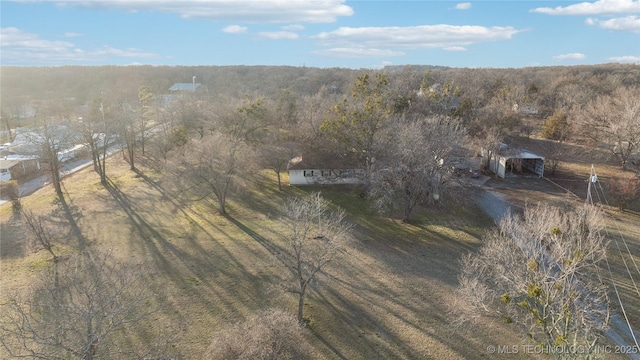 birds eye view of property featuring a rural view