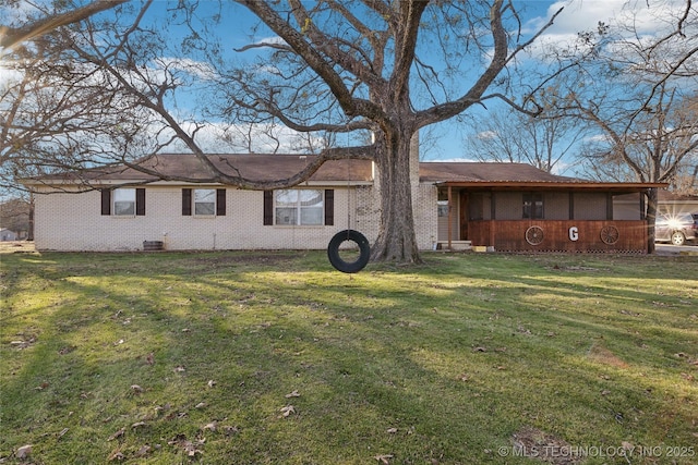 ranch-style house with a front yard