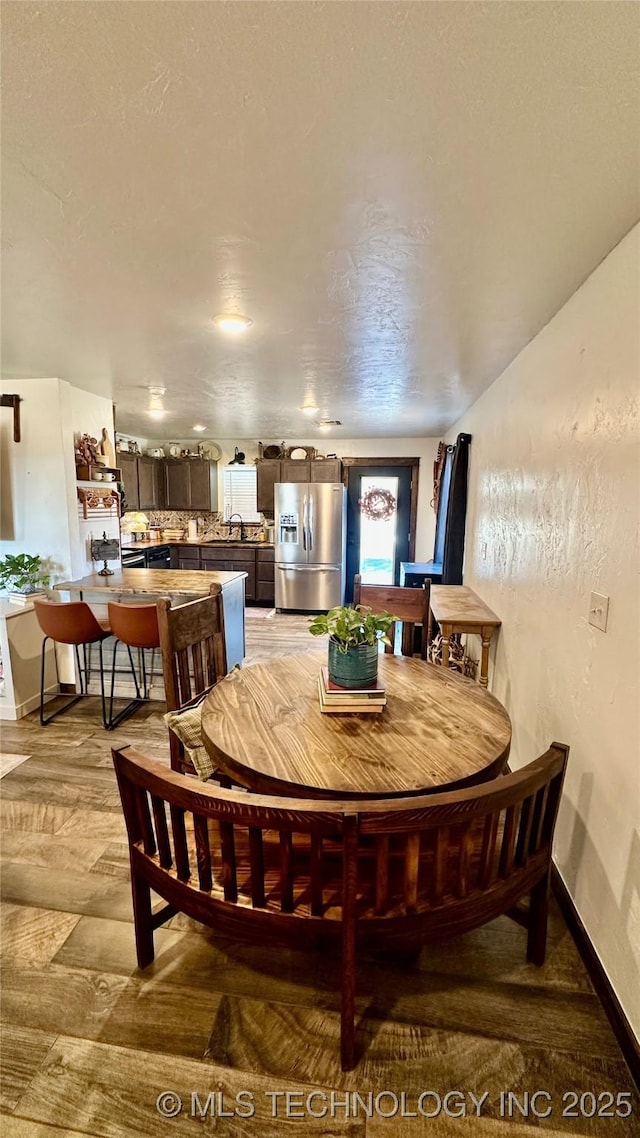 dining room featuring sink