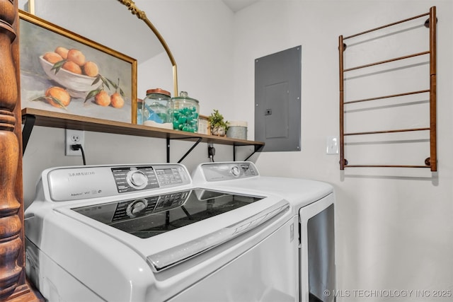 washroom with separate washer and dryer and electric panel