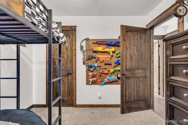 bedroom with light carpet