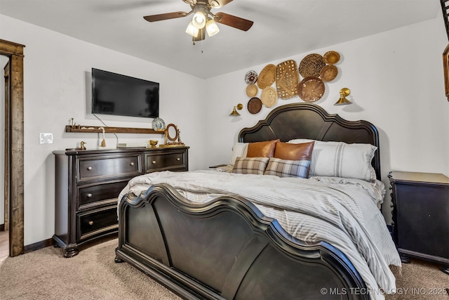 bedroom with light colored carpet and ceiling fan