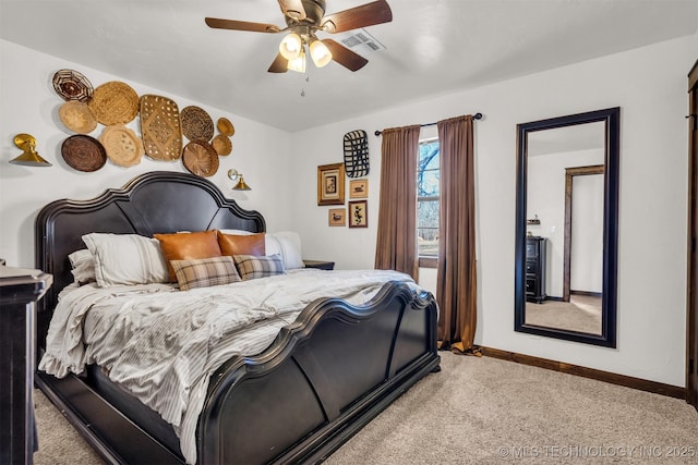 bedroom featuring light carpet and ceiling fan