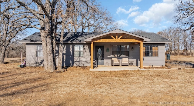 view of front of home featuring a patio