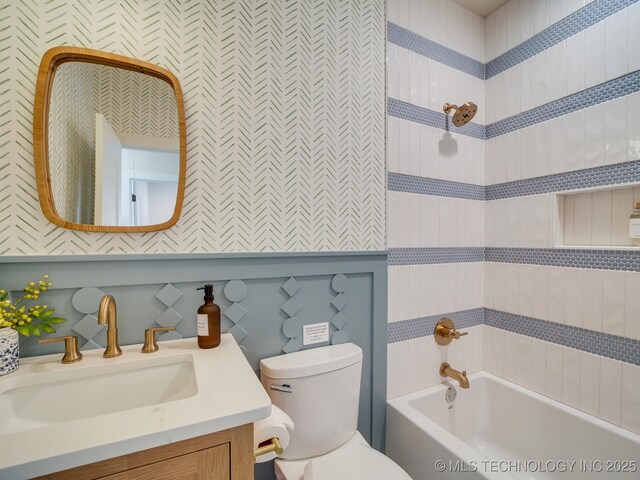 full bathroom with toilet, a bathing tub, a shower, and vanity