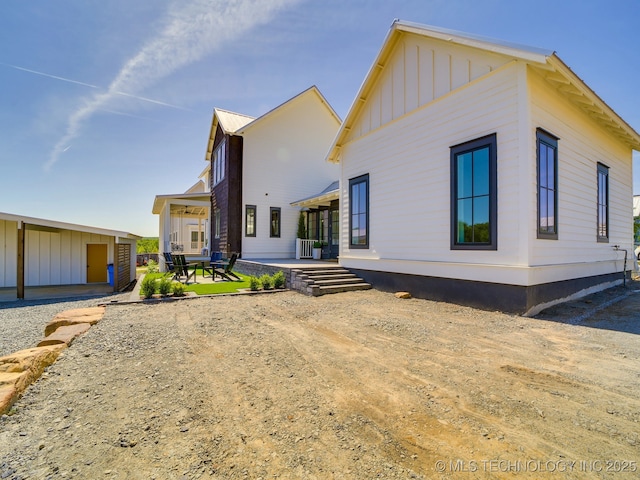 view of front facade with a patio area