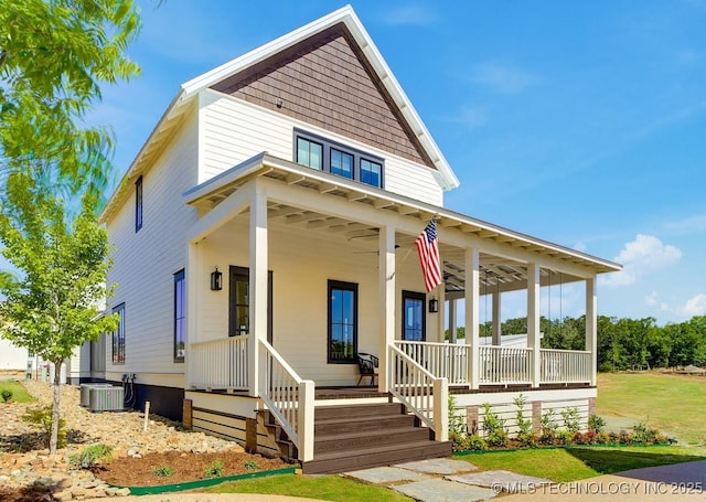 view of front of house with covered porch and central air condition unit